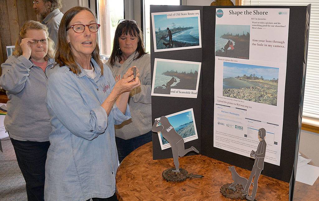 DAN HAMMOCK | GRAYS HARBOR NEWS GROUP                                Connie Allen talks about Wash Away No Mores Shape the Shore project. Local artist John Jones used a steel plasma cutter to create two statues to be placed at the end of Old State Route 105. The statues include a hole for photographers to aim through to help track the movement of the dynamic revetment protecting the North Cove shoreline.