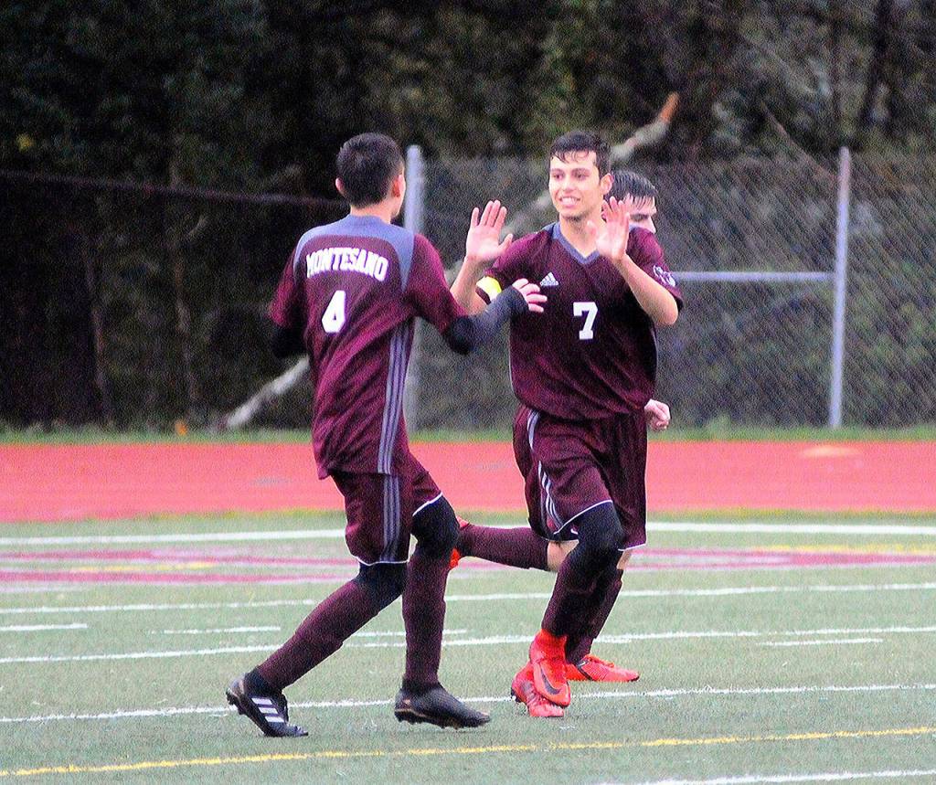 Montesanos Luis Muro (7) scores a goal and celebrates with his teammates after scoring a goal in the 10th minute against Ilwaco on Thursday. Muro scored three goals and picked up an assist in Montesanos 5-0 win. (Hasani Grayson | Grays Harbor News Group)