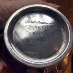(Kat Bryant | Grays Harbor News Group) This engraving on the sugar bowls base piqued Connie Parsons interest in its history.
