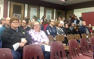 DAN HAMMOCK | GRAYS HARBOR NEWS GROUP Hoquiam School District employees gathered at the Hoquiam High School library prior to Tuesdays special school board meeting. The board later voted 4-1 in favor of a resolution to cut 19 school positions in the face of a $2 million budget deficit in the 2019-20 school year.