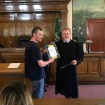 Louis Krauss | Grays Harbor News Group                                Brice Woods receives an award for 365 days sober in the Grays Harbor County drug court program.