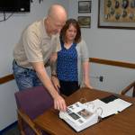 DAN HAMMOCK | GRAYS HARBOR NEWS GROUP                                Aberdeen Police Lt. C.J. Chastain and Det. Kristi Lougheed look through the case file of Laura Flink, who disappeared from Aberdeen 50 years ago. Flinks remains have never been found.