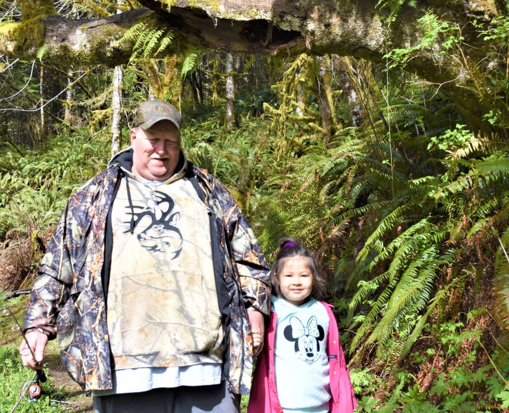 Photo by Willapa Harbor Drone                                Tim McGee and Lyrick Morley enjoying the day at the Mill Pond fishing derby April 6.
