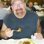 COURTESY PHOTO                                 Westport Mayor Rob Bearden enjoys his oysters at last years Ocosta oyster feed.