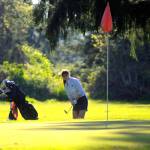 Hasani Grayson | Grays Harbor News | Group                                Montesanos Glory Grubb takes a chip shot from the edge of the rough on the last hole of the round of a match against Elma.