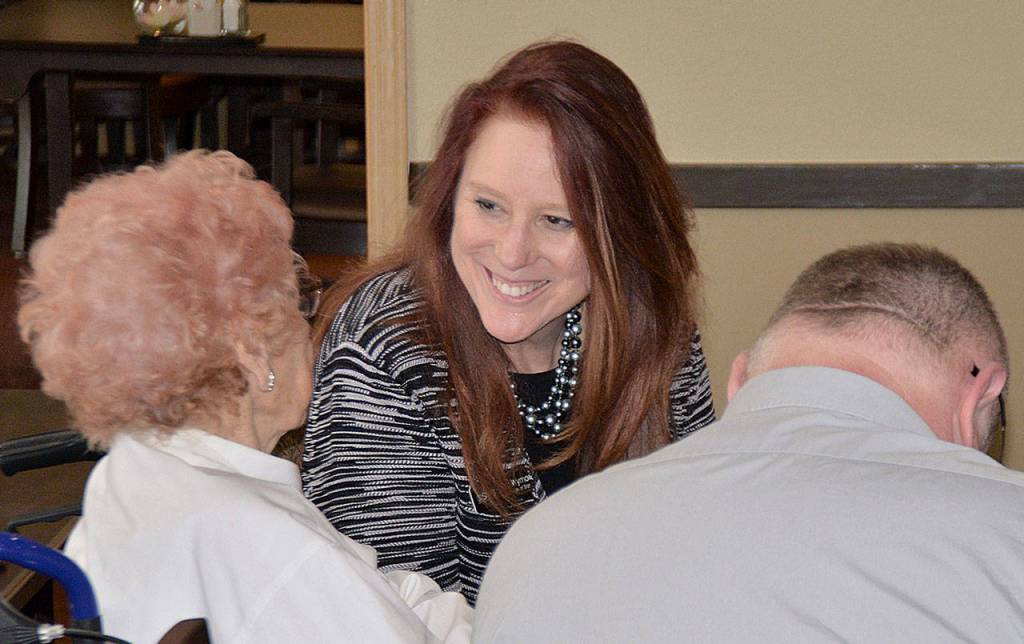 DAN HAMMOCK | GRAYS HARBOR NEWS GROUP                                Secretary of State Kim Wyman talks with a resident of the Channel Point Village retirement community after speaking there Thursday afternoon.