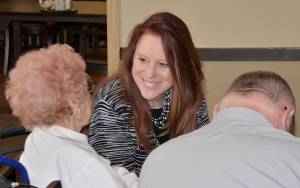 DAN HAMMOCK | GRAYS HARBOR NEWS GROUP                                Secretary of State Kim Wyman talks with a resident of the Channel Point Village retirement community after speaking there Thursday afternoon.