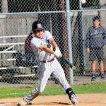 Montesanos Aaron Lano hits a single down the line to drive in a run in the third inning against Hoquiam on Friday. (Hasani Grayson | Grays Harbor News Group)