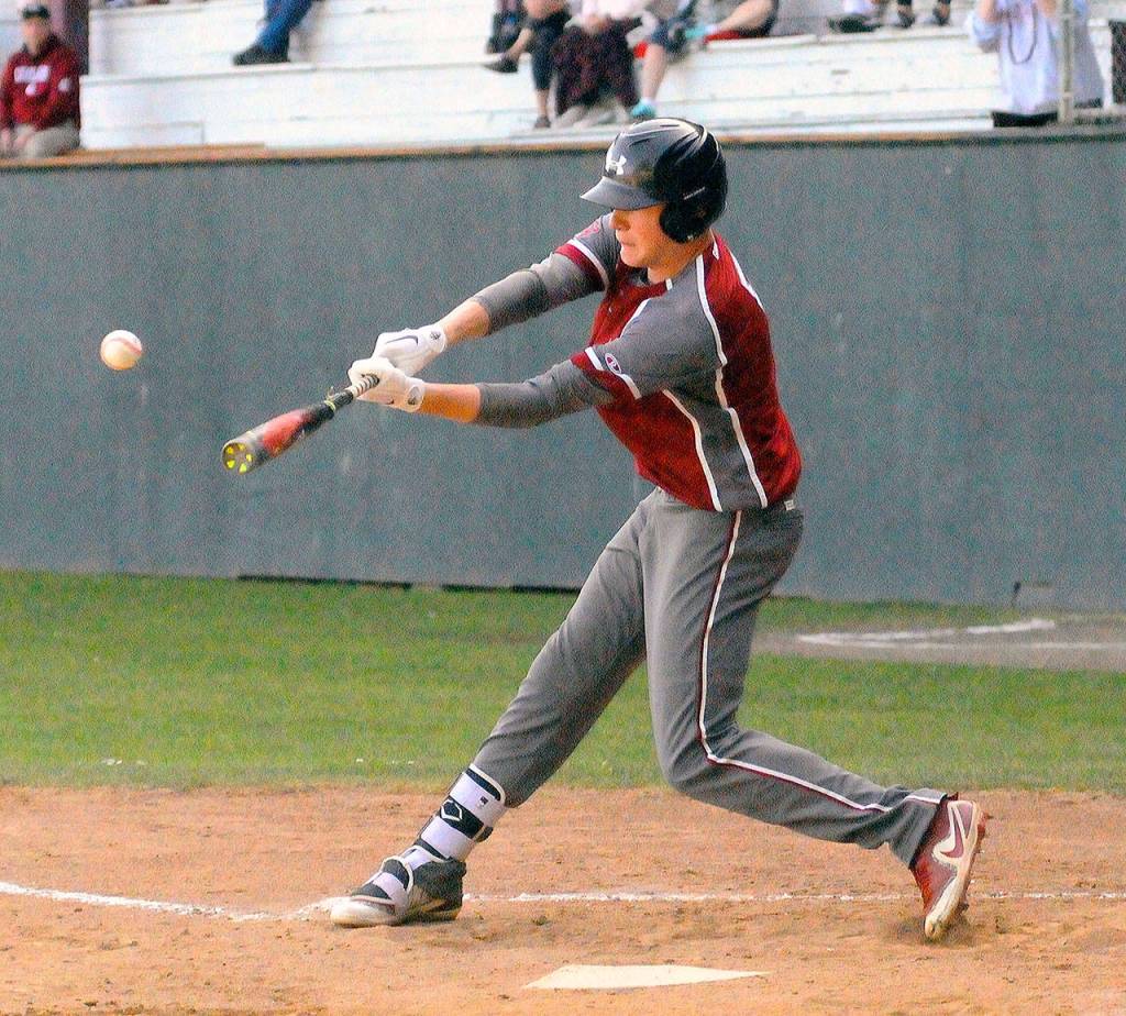 Hoquiams Kyle Larsen drives run in the fourth inning against Kings Way Christian. Larsen drove in four runs in the Grizzlies 10-4 win over the Knights. (Hasani Grayson | Grays Harbor Newsgroup)