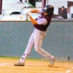 Montesanos Teegan Zillyet hits a double into the left centerfield gap against La Center on Monday at Olympic Stadium. (Hasani Grayson | Grays Harbor Newsgroup)