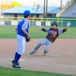 Montesanos Carter Olson slides into third base for a triple against La Center on Tuesday at Olympic Stadium.                                Hasani Grayson | Grays Harbor News Group