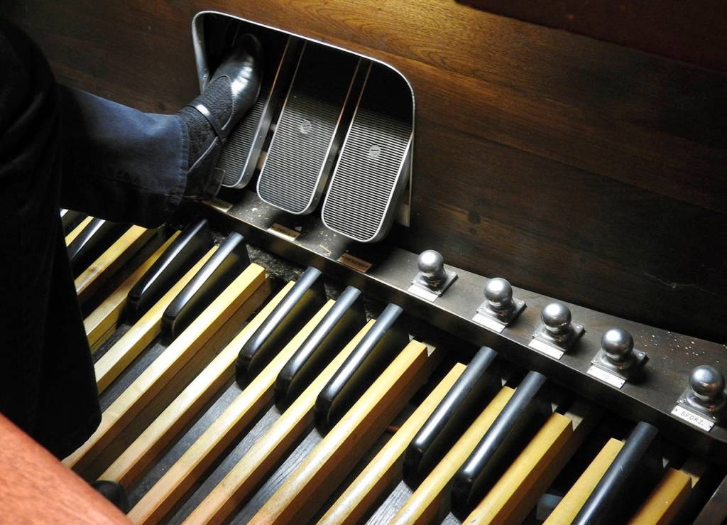 The organists feet control other functions, including the opening and closing of the shutters of the pipe room.
