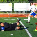 Elma keeper AJ Hernandez makes a save in the second half against Hoquiam on Friday. (Hasani Grayson | Grays Harbor News Group)
