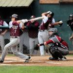 Montesanos Aaron Lano, left, belts a base hit against the Hoquiam Grizzlies on Saturday. Lano was one of four Bulldogs to collect two hits in the game. (Ryan Sparks | Grays Harbor News Group)