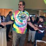 Ocosta Jr./Sr. High School art teacher Don Watkins played auctioneer at the event, which raised funds for his schools art program.