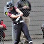 Ocosta infielder Kaylee Barnum hits one of her two home runs against Winlock on Friday at the 2B District IV Tournament in Centralia. Barnum had four hits to lead the Wildcats to a 13-7 victory in an elimination game. (Hasani Grayson | Grays Harbor News Group)