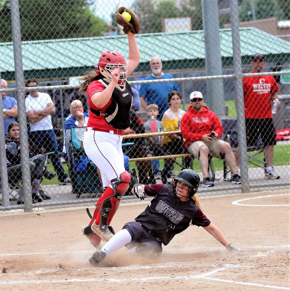 Montesanos Katie Granstrom slides home in the first inning against Coupeville in the first round of the 1A State Softball Tournament on Friday. Montesano advanced with a 17-1 victory. (Hasani Grayson | Grays Harbor News Group)