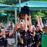 The Montesano Bulldogs celebrate after being presented the 1A State softball championship trophy after beating Castle Rock 5-4 on Saturday at the Columbia Playfield in Richland. (Hasani Grayson | Grays Harbor News Group)