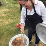 Kat Bryant | Grays Harbor News Group                                Tokeland Hotel co-owner and chef Heather Earnhardt stirs a pot full of crawfish, new potatoes and corn.