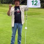 Eric Rydman poses for a photos after shooting an ace on the 12th hole on Thursday at Highland Golf Course. Rydman used a 9-iron to make the 120-yard shot. (Submitted photo)