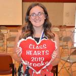 Brooke Bogdanovich poses with her coveted Hoquiam High School Class Heart award after the 2019 Class Day.