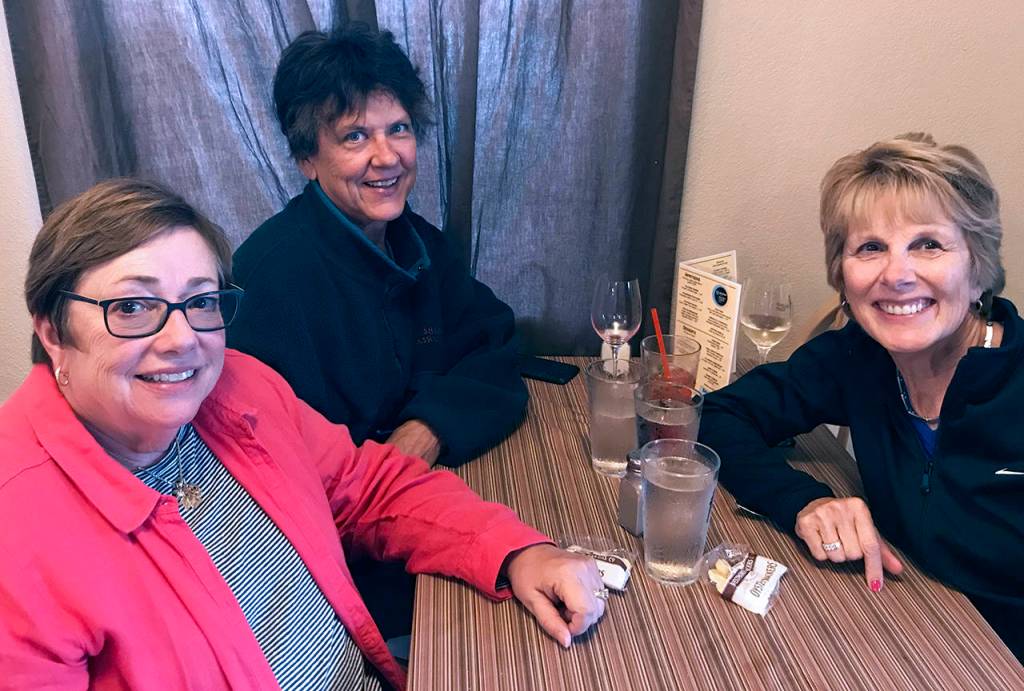 Courtesy Bette Worth                                From left, Jane Goldberg, Lynne Glore and Bette Worth discuss Grays Harbor College Foundation business in 2010.
