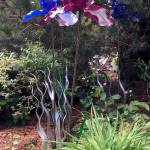 Kat Bryant | Grays Harbor News Group                                Artist Lora Malakoff created her tall Fleurs de Lis sculpture for the 2012 festival. It now stands at the edge of the seating area outside the restaurant.