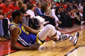 Gregory Shamus | Getty Images/TNS                                Golden State all-star forward Kevin Durant reacts after sustaining an injury Monday in the second quarter of Game Five of the 2019 NBA Finals against the Toronto Raptors at Scotiabank Arena in Toronto