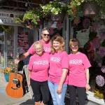 (Louis Krauss | Grays Harbor News Group) Bobbi McCracken, left, stands next to Downtown Aberdeen Association Executive Director Wil Russoul, Harbor Blooms owner Sheril Woodruff, and Bette Worth in front of the Harbor Blooms store.