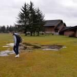 (Louis Krauss | Grays Harbor News Group) A Miller Junior High student walks across the field next to Miller, the area where a portable classroom to expand and host sixth-graders is expected to go.