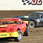 Photo courtesy AR Racing Videos                                Daryl Brumfield (No. 11) and Scott Fritts (No. 42) battle during Street Stocks racing on Saturday at Grays Harbor Raceway.
