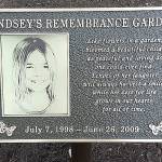 COURTESY MICHELLE AMES                                A plaque was installed Wednesday at the Lindsey Baum memorial garden in McCleary. The garden will be dedicated at 7 p.m. June 26, the 10-year mark of her disappearance.