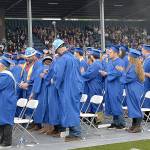 DAN HAMMOCK | GRAYS HARBOR NEWS GROUP                                Members of the 2019 Grays Harbor College graduating class applaud their supporters in the stands at Stewart Field during Fridays commencement ceremony.