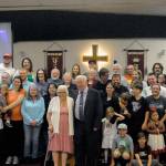 Delma and John Gilroy pose for a picture with family at the couples 70-year anniversary Lake Quinault Valley Chapel on Saturday. (Hasani Grayson | Grays Harbor News Group)