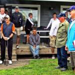 Former NFL coach and part-time Ocean Shores resident Dana LeDuc (far right) shares a laugh with fellow St. Louis Rams Super Bowl winning coaches Dick Vermeil and John Ramsdell (far left) and others at the 2017 Grays Harbor Youth Athletics benefit golf tournament. (North Coast News file photo)
