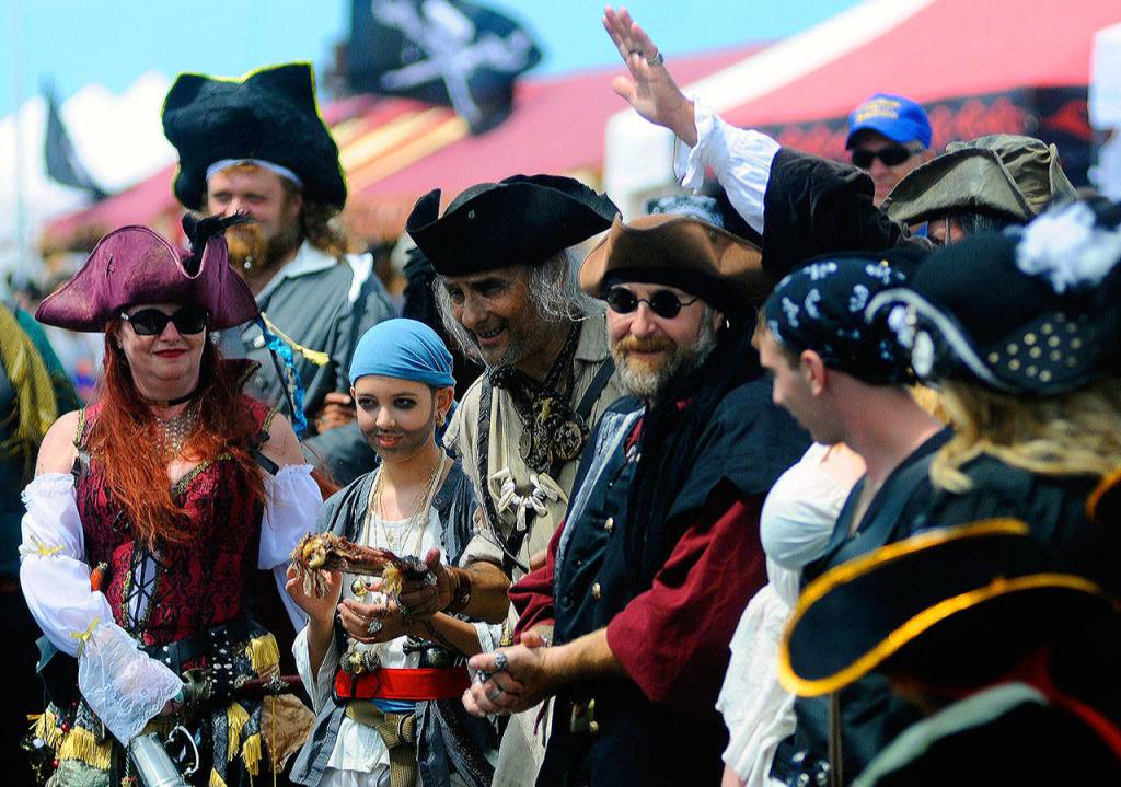 Pirate Daze visitors line up to have their costumes judged at the Marina on Saturday. (Hasani Grayson | Grays Harbor News Group)