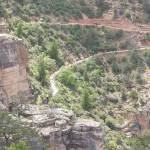 The serpentine and world-famous Bright Angel trail makes its way along the cliffs from the South Rim and eventually to the Colorado River below.