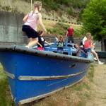(Kat Bryant | Grays Harbor News Group) Some kids play in a boat at Morrison Riverfront Park during Splash Festival 2018.