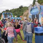 DAN HAMMOCK | GRAYS HARBOR NEWS GROUP                                The bounce houses drew a lot of families at the Aberdeen Splash Festival Thursday.