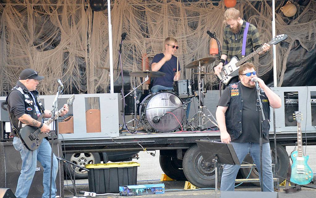 Rock band Electric Eye performs a set at the Grays Harbor Historical Seaport during the festival.