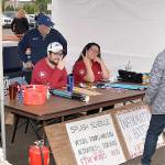 Staff from the Grays Harbor Historical Seaport sell tickets for tours aboard the tall ship Lady Washington during the Splash Festival.