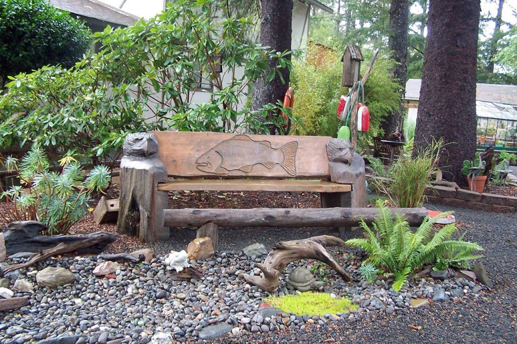 The 15-year garden called Deep in the Woods offers a tranquil variety of textures with plants, rocks, driftwood, shells, small fountains, birdbaths and wood carvings.