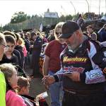Modifieds driver Brian Harding signs autographs during fan appreciation ceremonies on Saturday at Grays Harbor Raceway in Elma. (Photo by AR Racing Videos)
