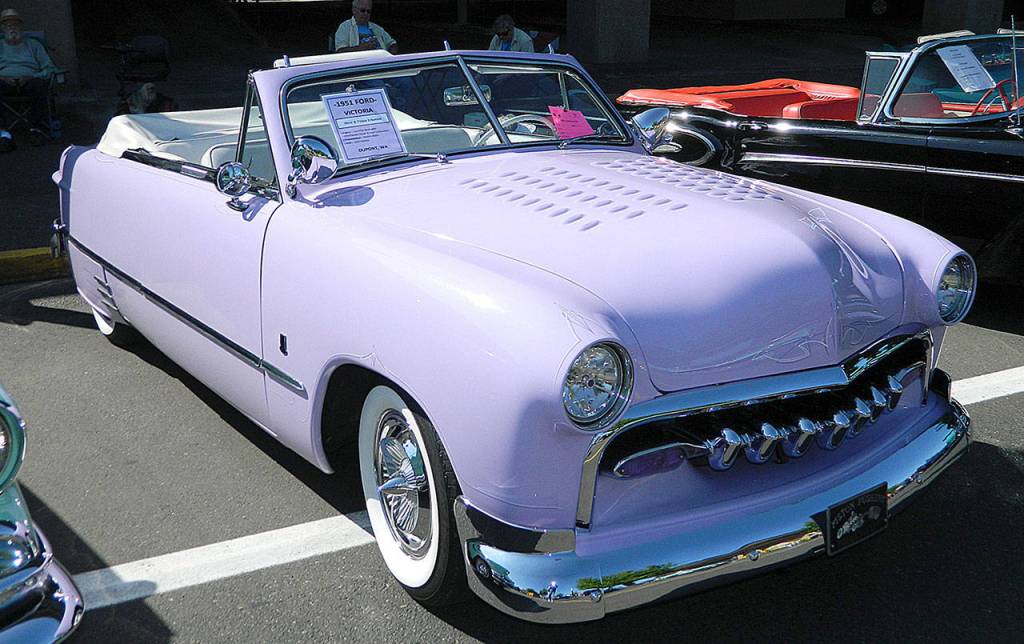 Photo by Dan Dugas                                Steve and Vicki Frkorich of DuPont showed this lavender 1951 Ford Victoria convertible at the 2018 Rod Fest.