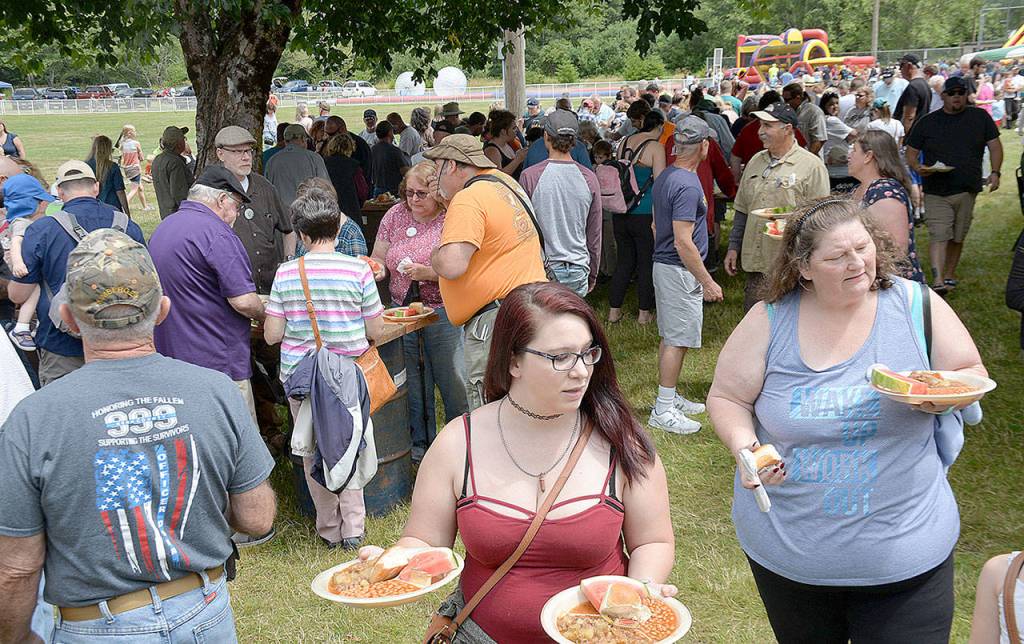 DAN HAMMOCK | GRAYS HARBOR NEWS GROUP                                The lack of bear meat in the stew didnt stop hundreds from nabbing a plateful at the McCleary Bear Festival Saturday.
