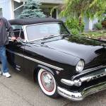 Photos by Michael Lang | Grays Harbor News Group                                Denny Foster stands next to his 1954 Ford Sunliner, which he restored, at his Montesano home. It will be among the dozens shown at the annual Historic Montesano Car Show on Saturday.