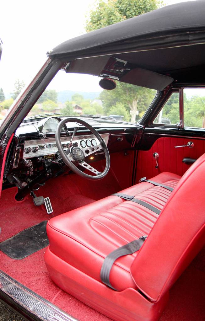 The interior of Denny Fosters 1954 Ford Sunliner is lacking some modern safety features.