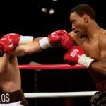 Pernell Sweet Pea Whitaker mixes it up with Carlos Bojorquez during the first round of their matchup at Ceasers Tahoe on April 27, 2001. Whitaker died Sunday night after being struck by a vehicle in Virginia Beach, Virginia. (Scott Sady/Virginian Pilot/TNS)