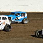 Kelly Martin (8), Brian Taylor (5W) and Chris Kress vie for position during a PHRA Dwarf Cars race on Friday at Grays Harbor Raceway. (Photo by AR Racing Videos)