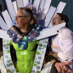 Wil Russoul and wife Kristi Daniels enjoyed one of the step-in costumes set up along K Street.